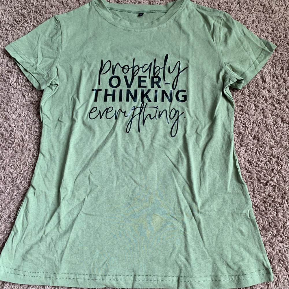 Green Shirt With Writing